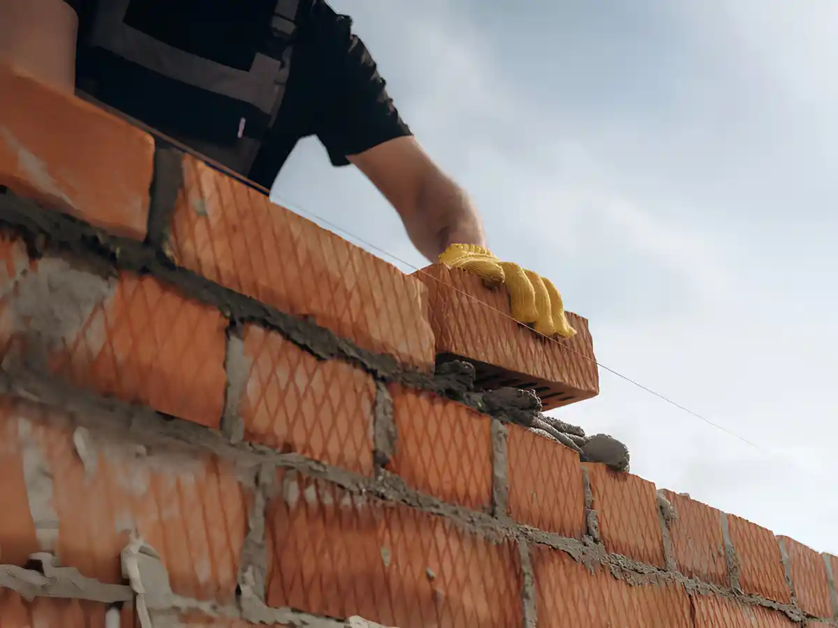 Repointing mortar joints on a stack