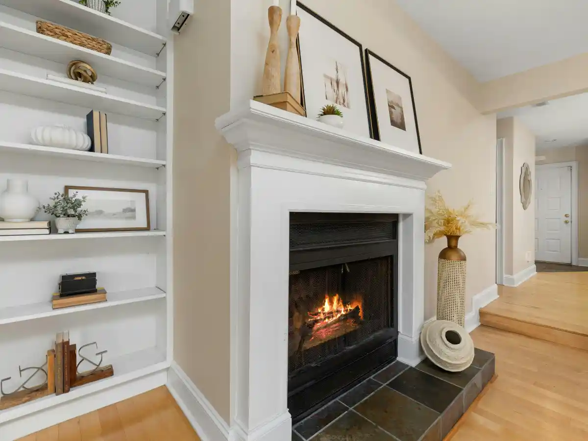 Technician servicing a fireplace insert