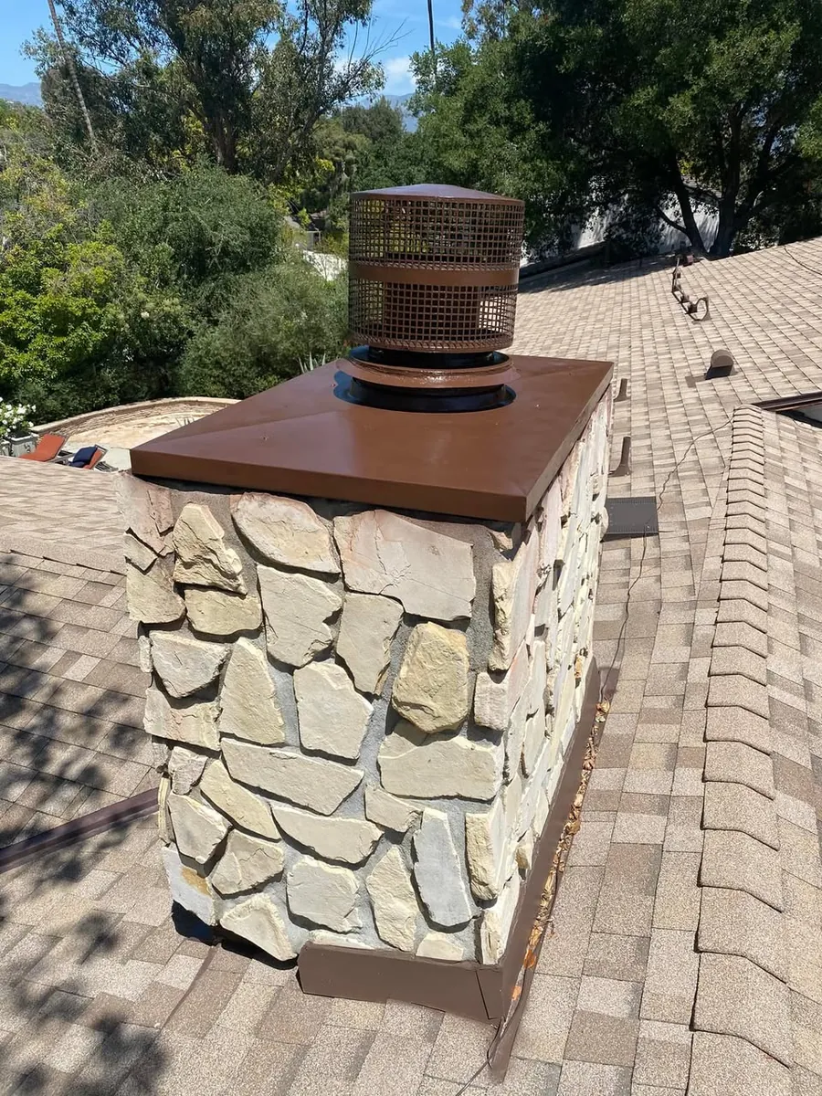 Masonry chimney on a pitched roof